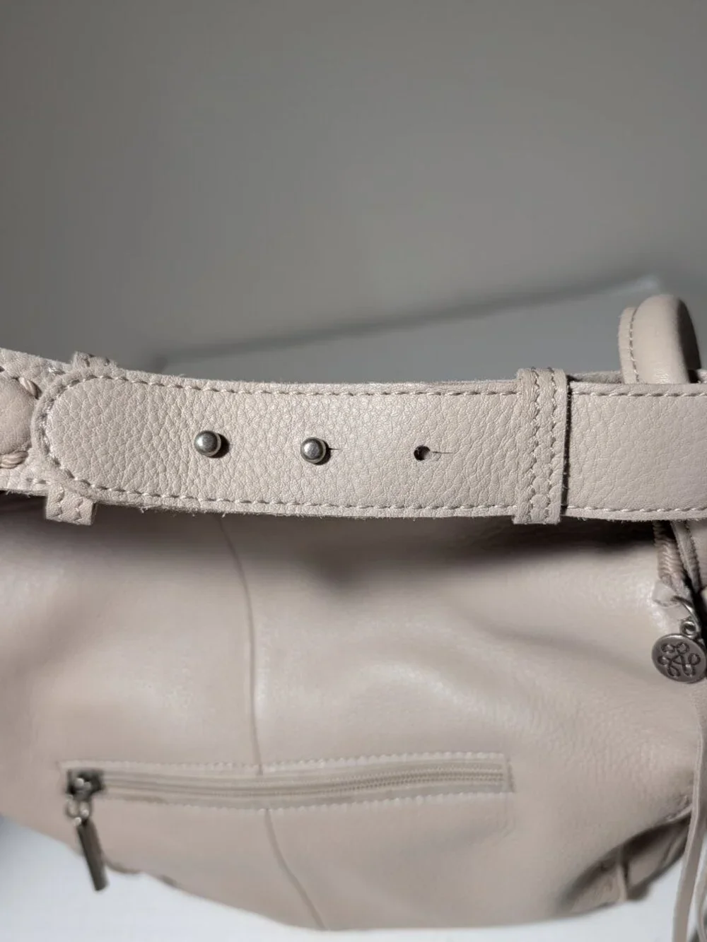 The SAK Pebble Leather Adjustable Top Handle Hobo Purse Cream OS
